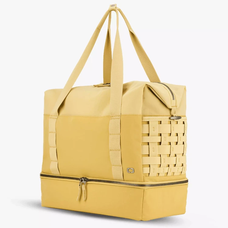 damska-torba-podrozna-ogio-rise-weekender-36l-zolty-laptop-skos.webp