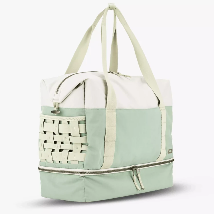 damska-torba-podrozna-ogio-rise-weekender-36l-zielony-laptop.webp