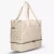 damska-torba-podrozna-ogio-rise-weekender-36l-bezowa-laptop.webp