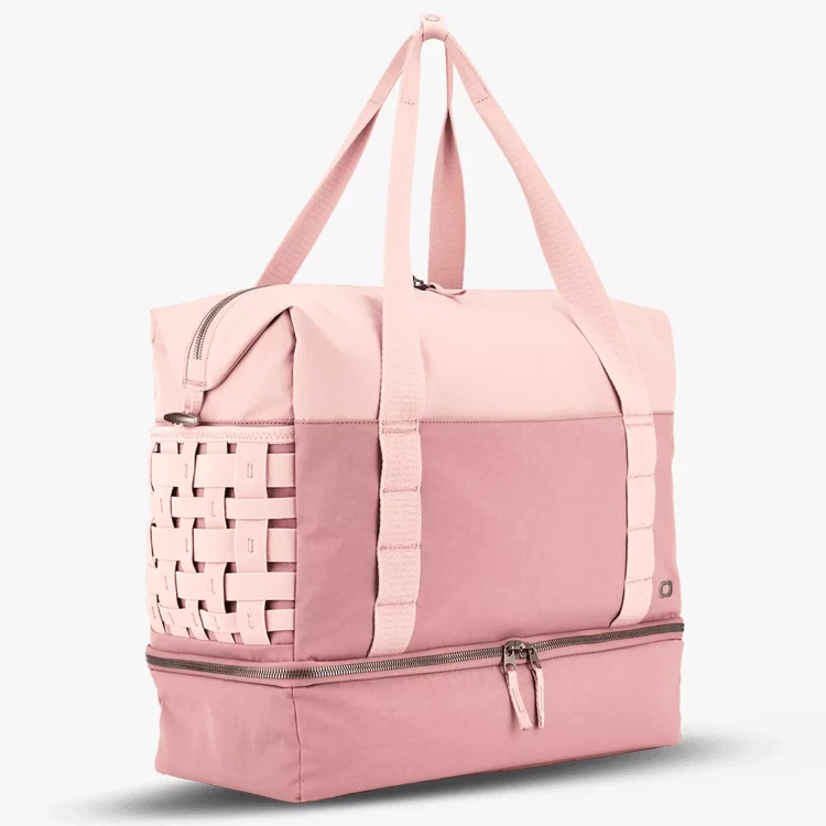 damska-torba-podrozna-ogio-rise-weekender-36l-rozowa-laptop.webp